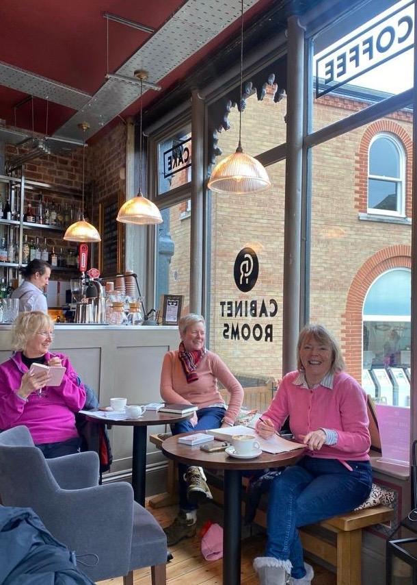 Bloomsbury art course students sketching over coffee at Cabinet Rooms café, Winchester