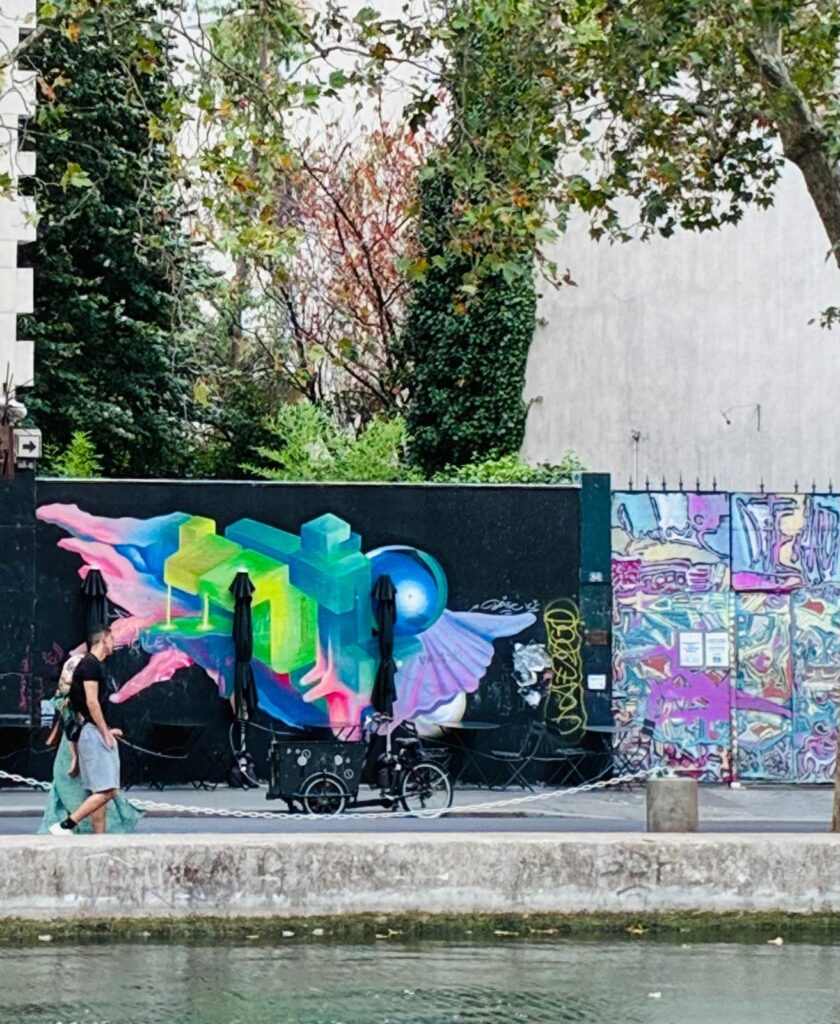Street art mural along the Canal Saint-Martin, Paris